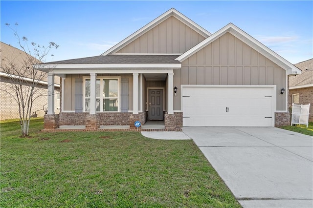 view of front facade featuring an attached garage, a front lawn, concrete driveway, and brick siding