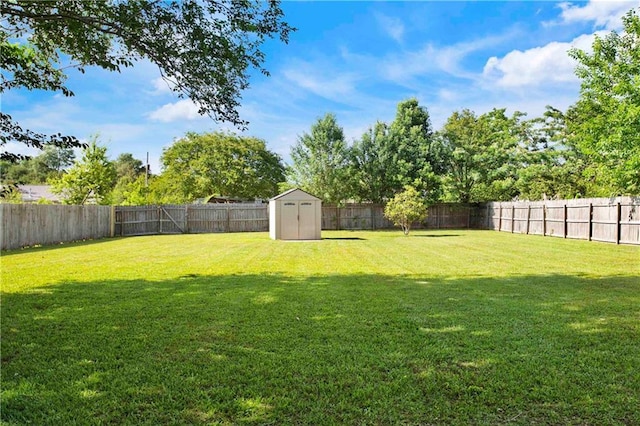 13310 August Dr, Mobile, AL 36695 - view of yard featuring a storage unit and an outdoor structure