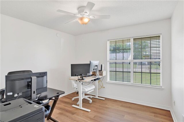 13310 August Dr, Mobile, AL 36695 - office area featuring wood finished floors, ceiling fan, and baseboards