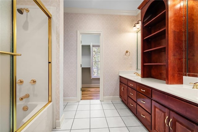 bathroom with tile patterned floors, enclosed tub / shower combo, ornamental molding, and vanity