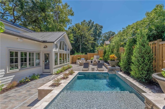 view of pool with a patio area