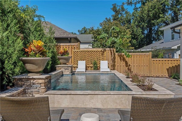 view of pool with a patio area