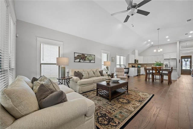 living room with ceiling fan, high vaulted ceiling, hardwood / wood-style flooring, recessed lighting, and visible vents