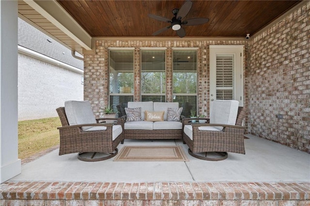 view of patio with outdoor lounge area and ceiling fan