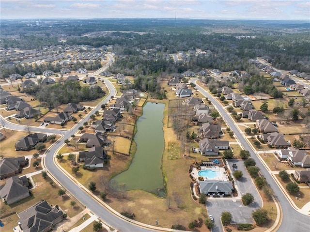 aerial view featuring a water view and a residential view