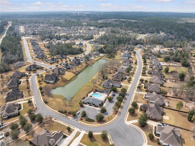 aerial view featuring a residential view and a water view