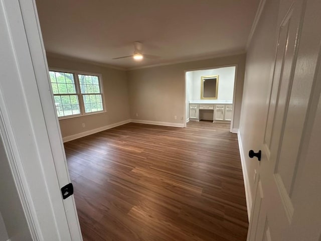 3050 Lacoste Rd, Mobile, AL 36618 - empty room with ornamental molding, dark wood-style flooring, a ceiling fan, and baseboards