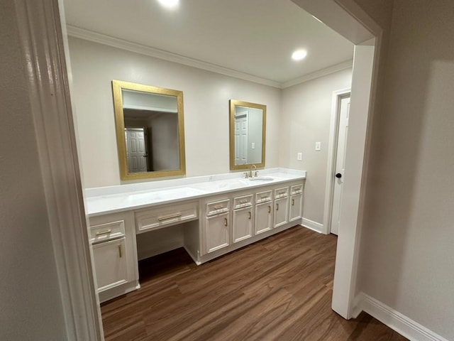 3050 Lacoste Rd, Mobile, AL 36618 - bathroom with crown molding, vanity, wood finished floors, and baseboards