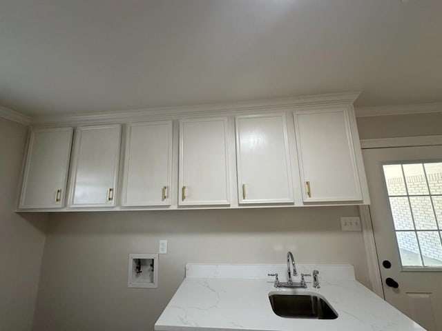 3050 Lacoste Rd, Mobile, AL 36618 - washroom featuring hookup for a washing machine, cabinet space, and crown molding