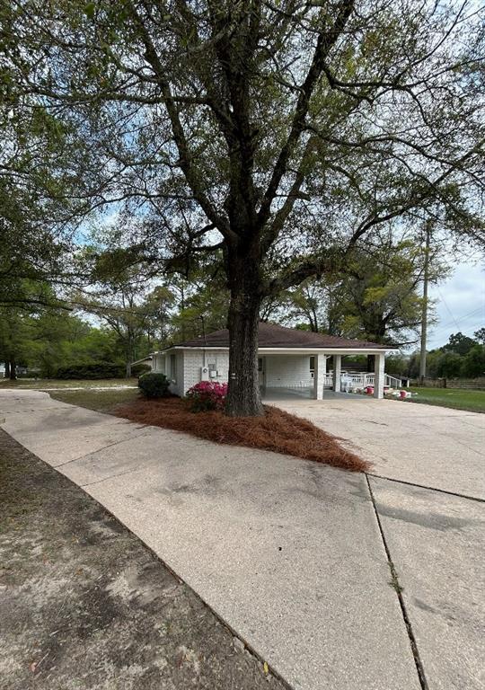 3050 Lacoste Rd, Mobile, AL 36618 - view of front of home with driveway and a carport