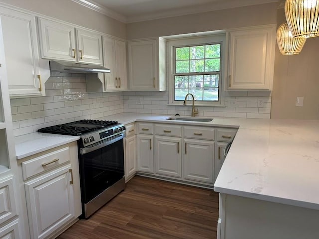 3050 Lacoste Rd, Mobile, AL 36618 - kitchen featuring gas stove, a sink, white cabinets, dark wood finished floors, and crown molding