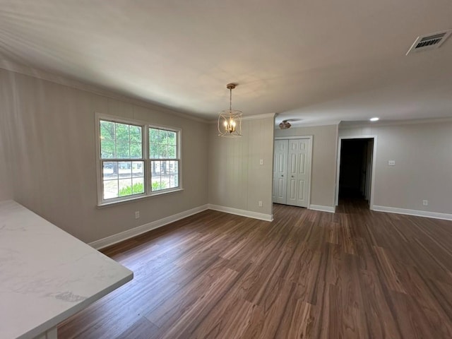 3050 Lacoste Rd, Mobile, AL 36618 - unfurnished dining area with baseboards, a chandelier, dark wood finished floors, and crown molding