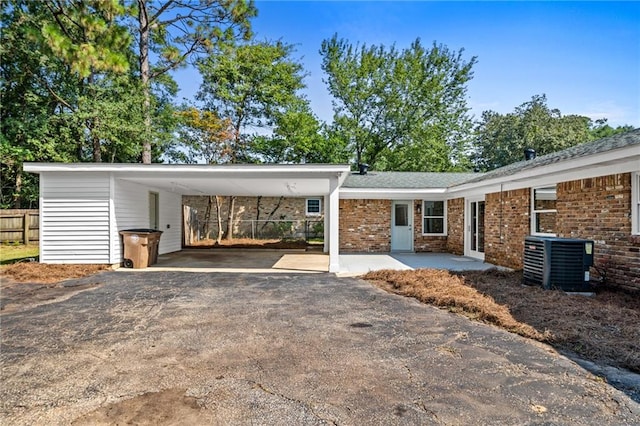 exterior space with a carport