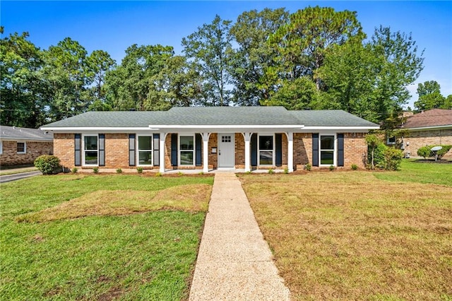 ranch-style home with a front yard