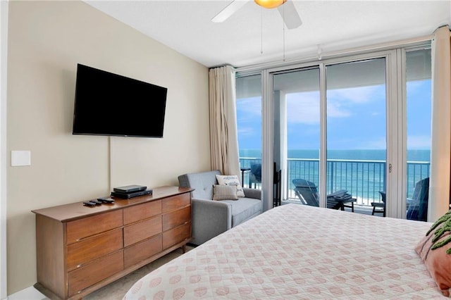 bedroom featuring access to exterior, multiple windows, and ceiling fan