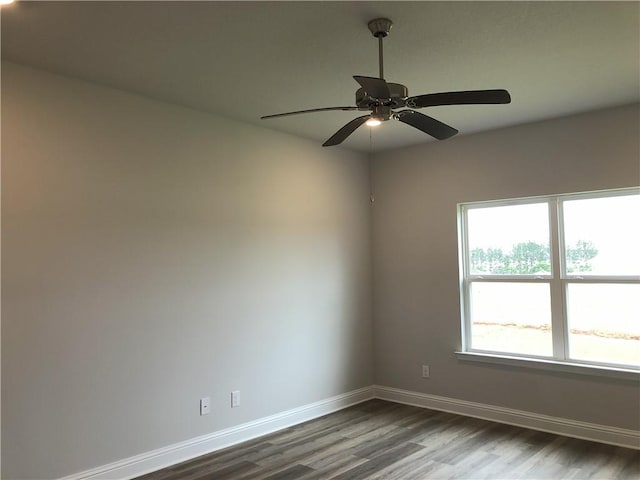 7323 Hawkins Mnr N, Mobile, AL 36695 - empty room with dark wood-style floors, baseboards, and ceiling fan
