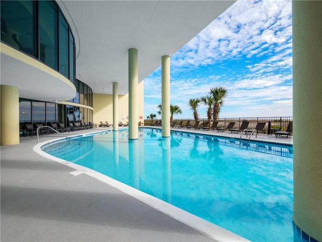 view of swimming pool with a patio area