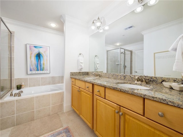 bathroom featuring vanity, tile patterned flooring, crown molding, and plus walk in shower