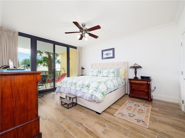 bedroom featuring ceiling fan, access to exterior, crown molding, and light hardwood / wood-style floors