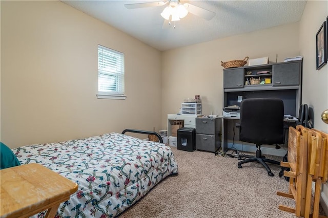 carpeted bedroom with a ceiling fan