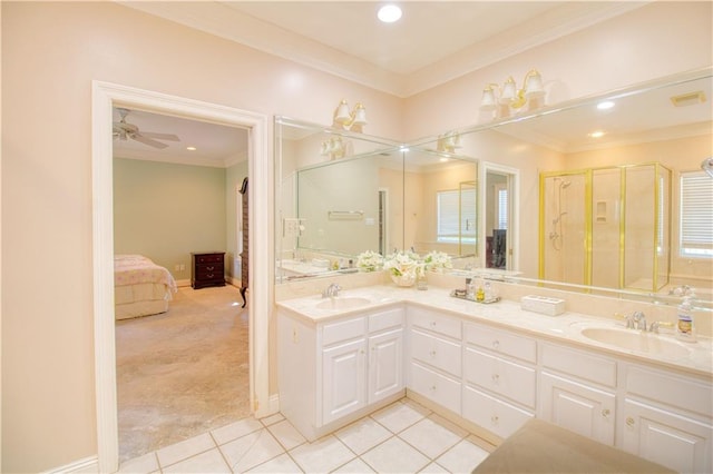 bathroom featuring ornamental molding, vanity, and ceiling fan