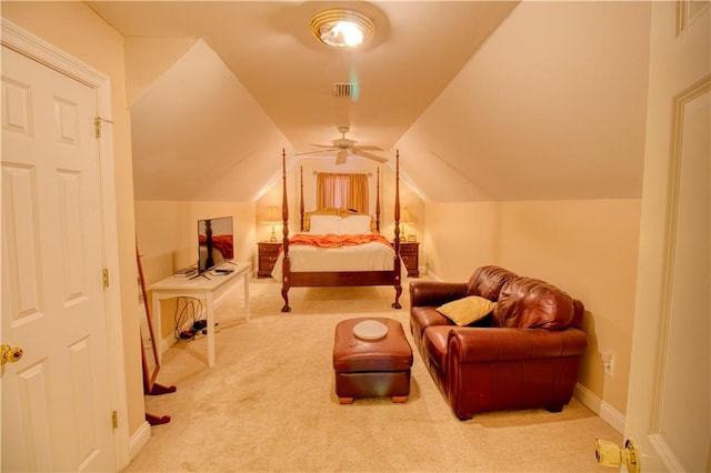 bedroom featuring lofted ceiling, light carpet, and ceiling fan