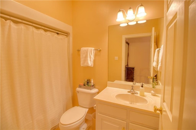 8857 Dawes Lake Rd S, Mobile, AL 36619 - bathroom with toilet, vanity, and a shower with shower curtain