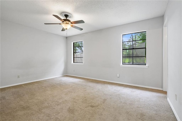 5717 Post Oak Ct, Mobile, AL 36609 - carpeted spare room with a textured ceiling, ceiling fan, and baseboards