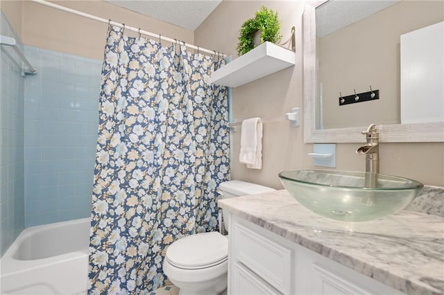 5717 Post Oak Ct, Mobile, AL 36609 - bathroom with vanity, toilet, shower / bath combination with curtain, and a textured ceiling