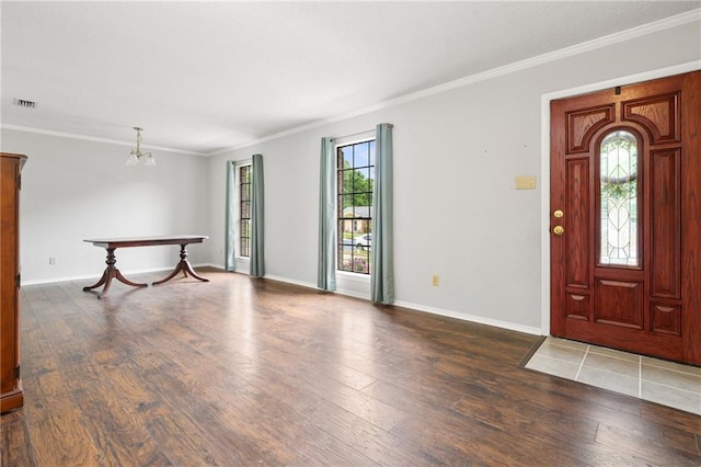5717 Post Oak Ct, Mobile, AL 36609 - entryway with wood finished floors, ornamental molding, and baseboards