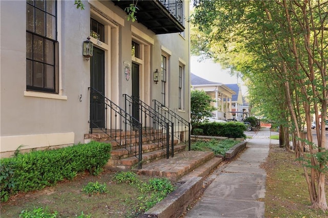 exterior space featuring stucco siding