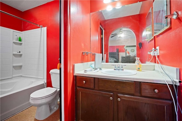 full bathroom featuring shower / bathing tub combination, vanity, tile patterned flooring, toilet, and a textured ceiling