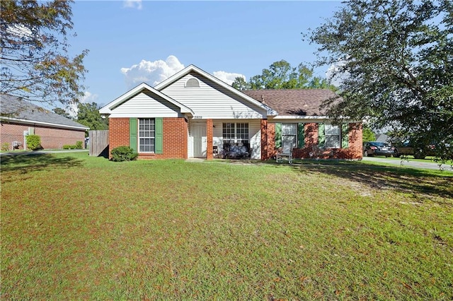 view of front of property with a front lawn