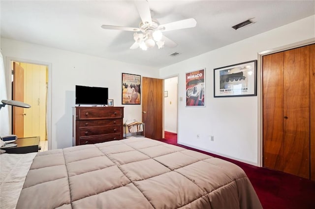 bedroom featuring ceiling fan, ensuite bathroom, and a closet