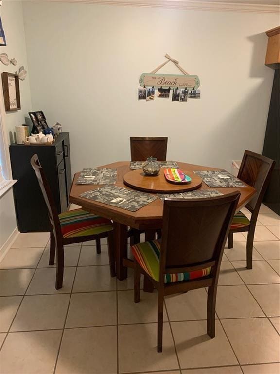 dining area with light tile patterned flooring