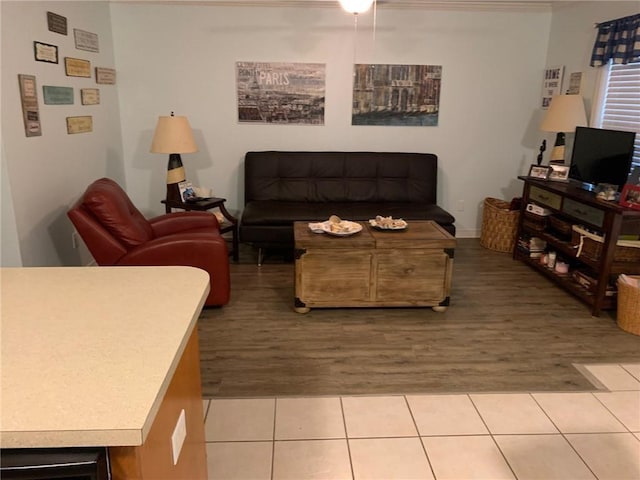 living room with light tile patterned floors