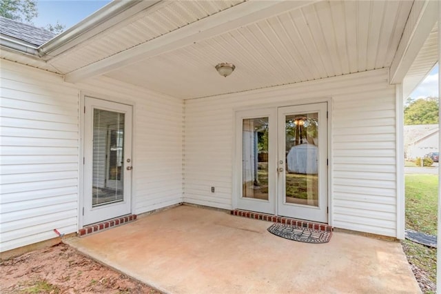 entrance to property with a patio