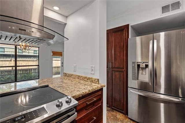 2901 Grant St Unit 601, Mobile, AL 36606 - kitchen with appliances with stainless steel finishes, wall chimney exhaust hood, a chandelier, ornamental molding, and light stone countertops