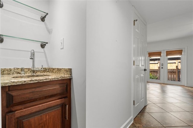 2901 Grant St Unit 601, Mobile, AL 36606 - bathroom featuring vanity, tile patterned flooring, and french doors