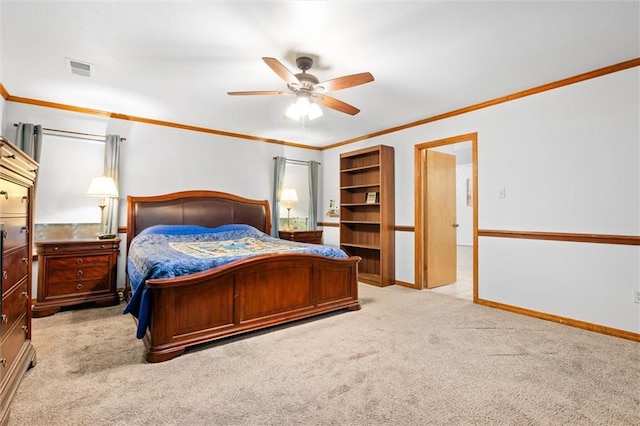 bedroom featuring ceiling fan, light colored carpet, and ornamental molding