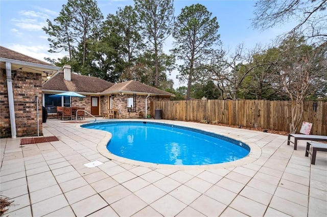 view of pool with a patio