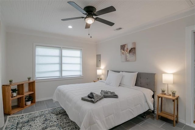 tiled bedroom featuring ceiling fan and ornamental molding