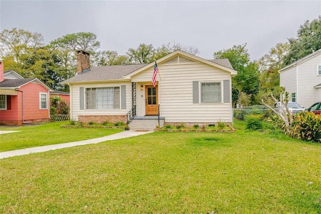 view of front facade with a front lawn