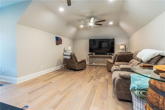 living area featuring a ceiling fan, baseboards, light wood-style floors, lofted ceiling, and recessed lighting