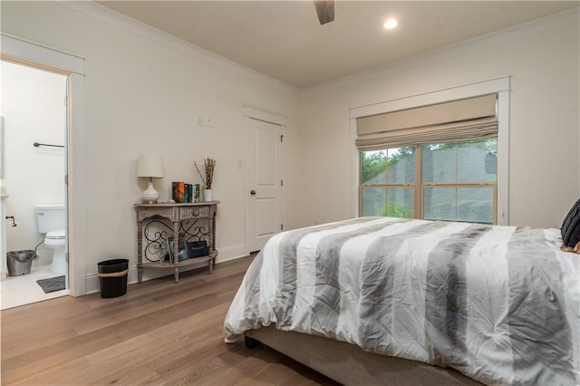 bedroom featuring ornamental molding, baseboards, recessed lighting, and wood finished floors