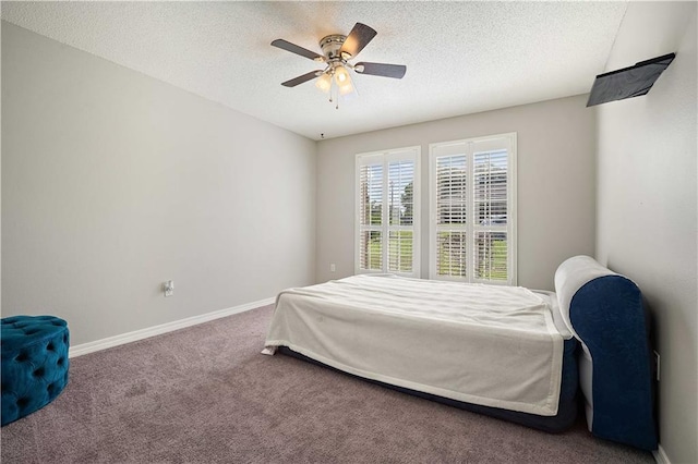 4072 Fenwick Loop, Mobile, AL 36619 - carpeted bedroom featuring a textured ceiling and a ceiling fan