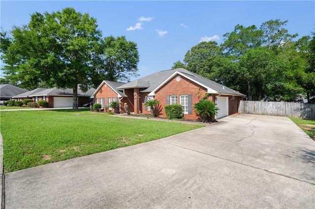 4072 Fenwick Loop, Mobile, AL 36619 - single story home with driveway, a garage, and brick siding