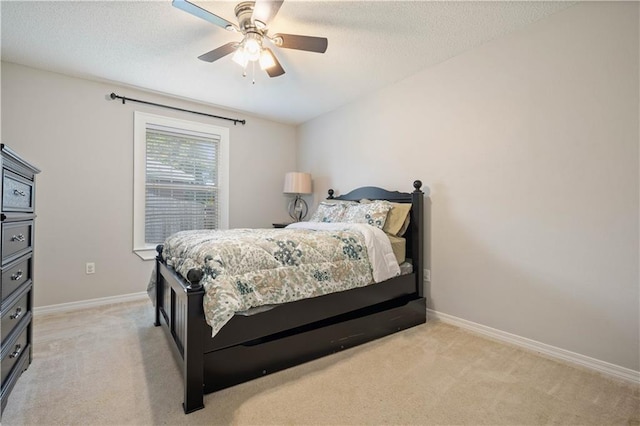 4072 Fenwick Loop, Mobile, AL 36619 - bedroom featuring light colored carpet, a textured ceiling, and a ceiling fan