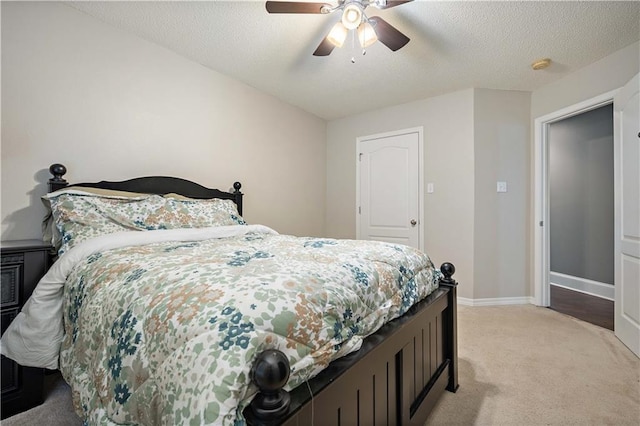 4072 Fenwick Loop, Mobile, AL 36619 - bedroom featuring light colored carpet, ceiling fan, and a textured ceiling