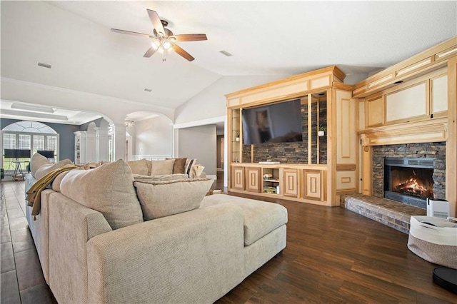 4072 Fenwick Loop, Mobile, AL 36619 - living area with arched walkways, ornate columns, a ceiling fan, lofted ceiling, and dark wood-style floors